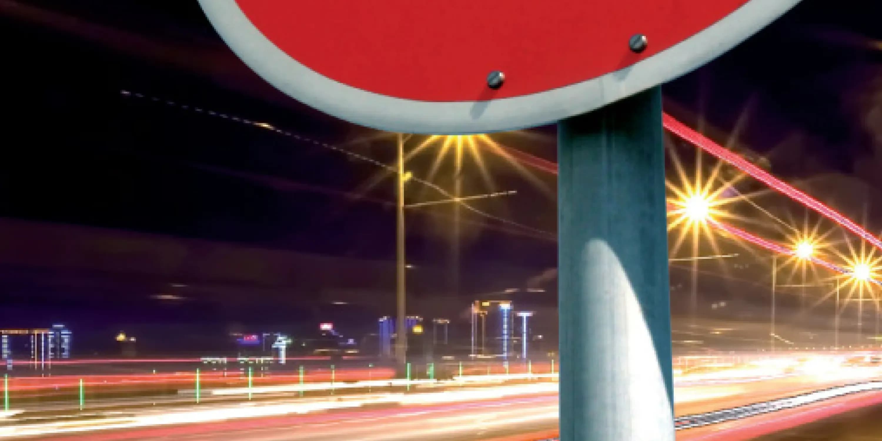 Stop sign with blurred background of motorway