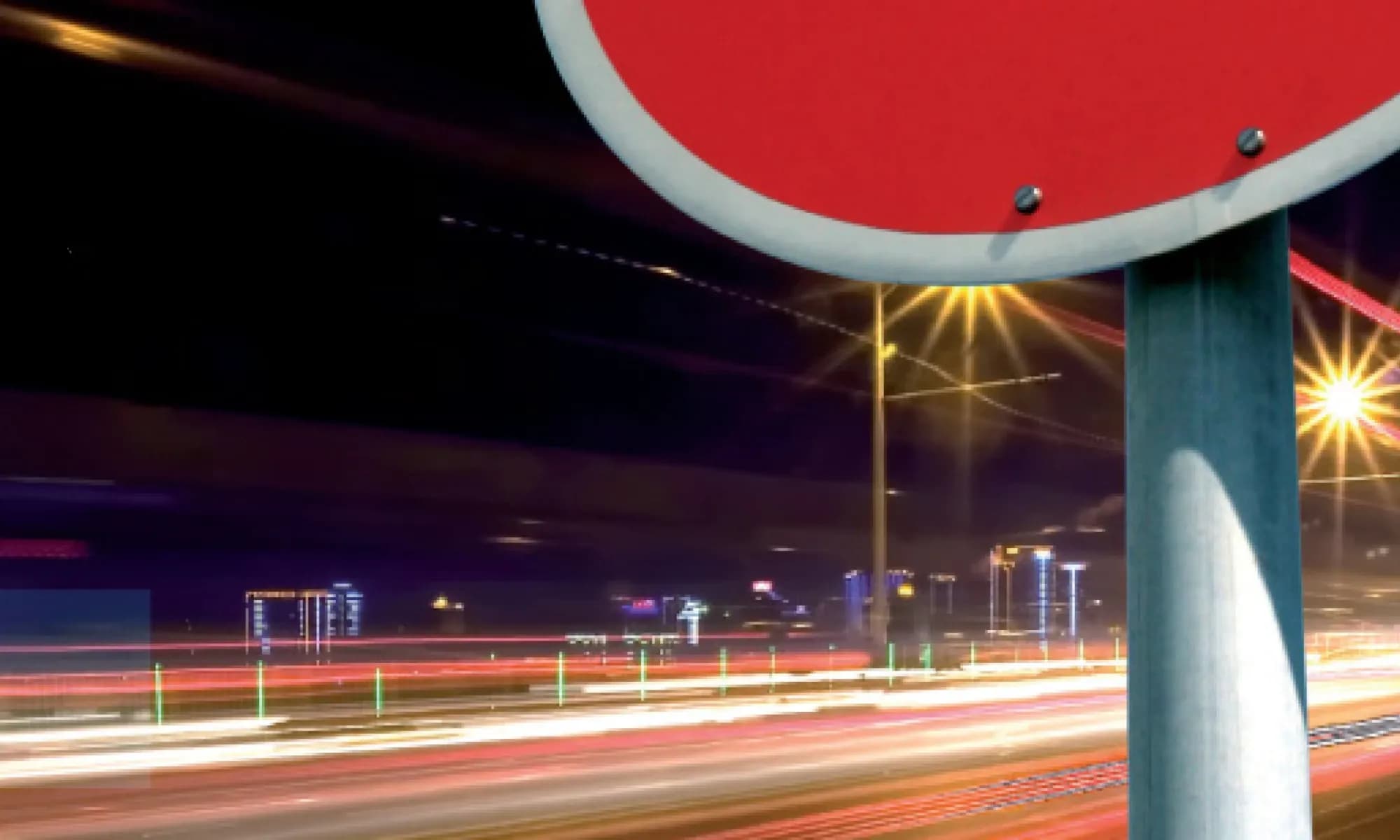 Stop sign with blurred background of motorway